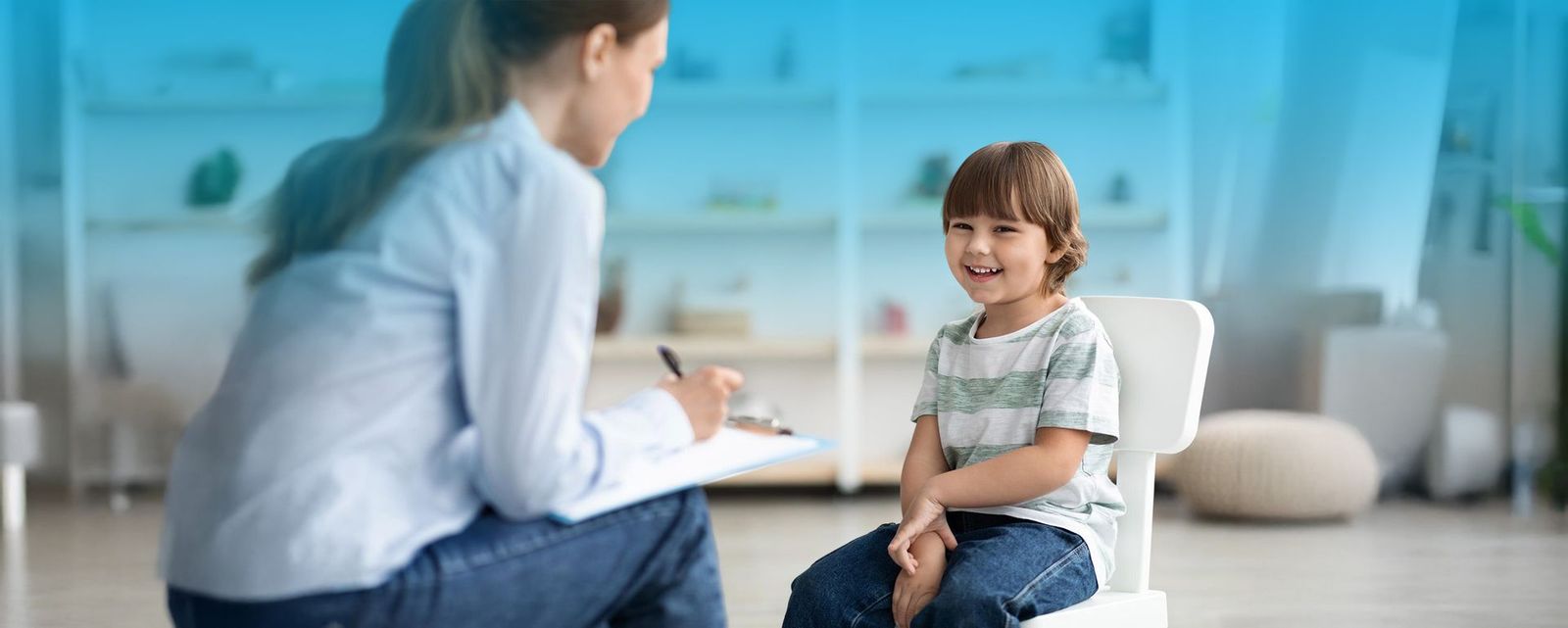 Therapist and child in a session